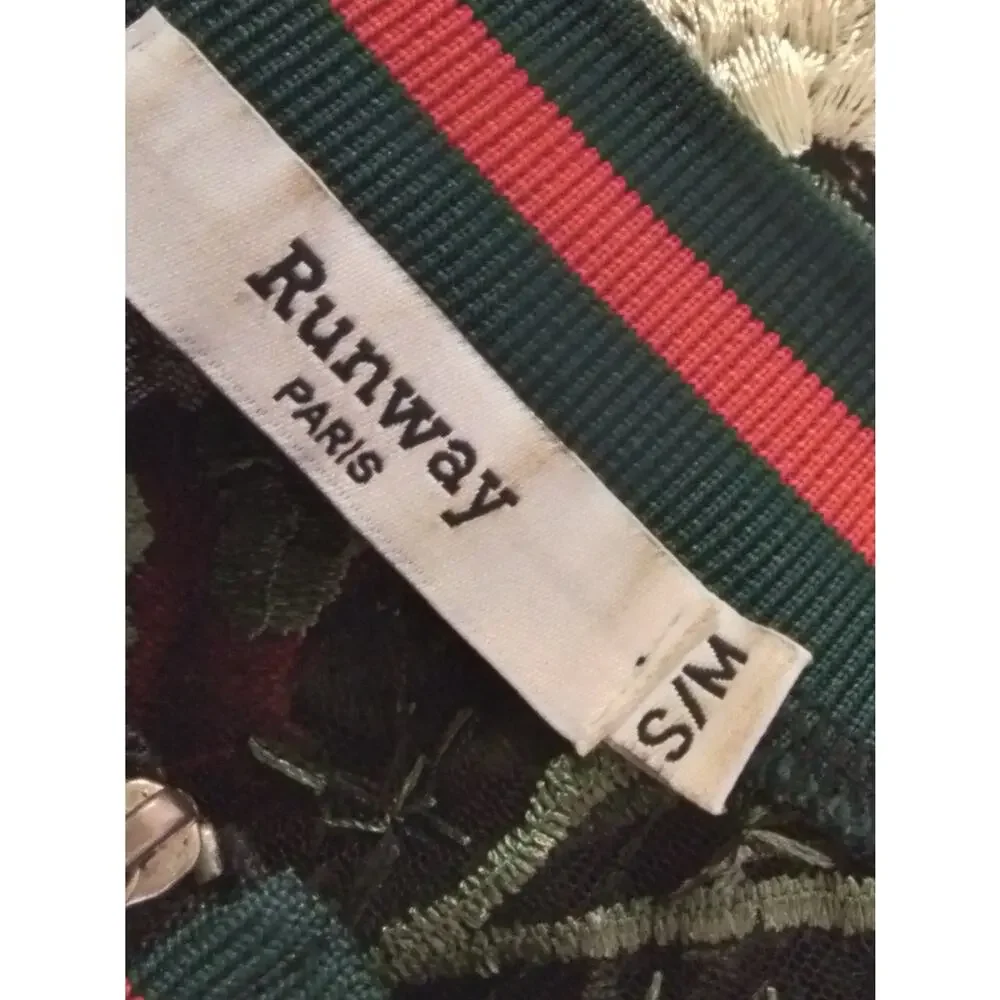Runway Paris green jacket